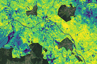 Aerial imagery overlaid with satellite data depicting photosynthetic activity of the vegetation in the national park.